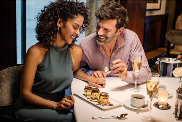 Couple eating at NCL's dining room